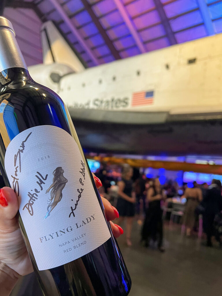 Flying Lady bottle signed by astronauts at the Endeavor Awards